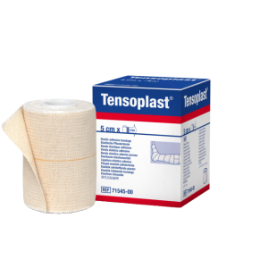 Een rol tensoplast van 5cm breed naast het verpakkingsdoosje