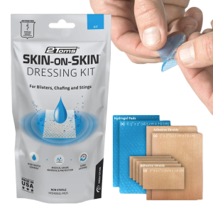 Een overzicht van de inhoud van een 2toms 2nd Skin Dressing verpakking.