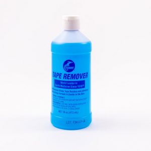 De Cramer tape remover in een fles met blauw vloeistof.
