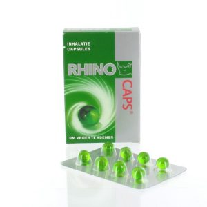 Een doosje Rhino Caps inhalatiecapsules van 16 stuks met daar voor liggend een strip van 8 stuks